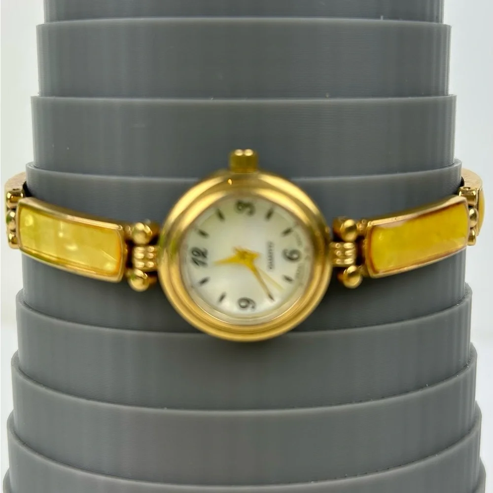 Elegant Avon Gold Tone Watch with Yellow Accents, 1